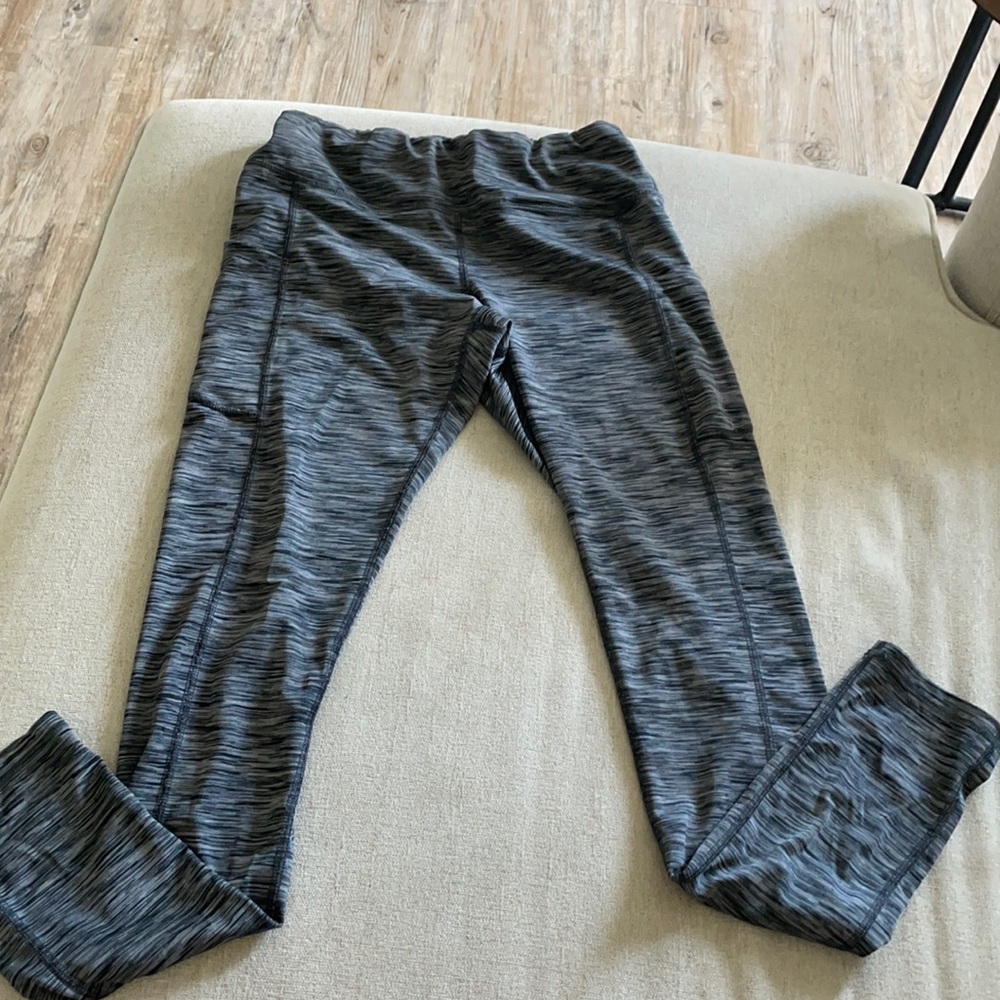 Iuga. Gray striped leggings.  Worn a few times.